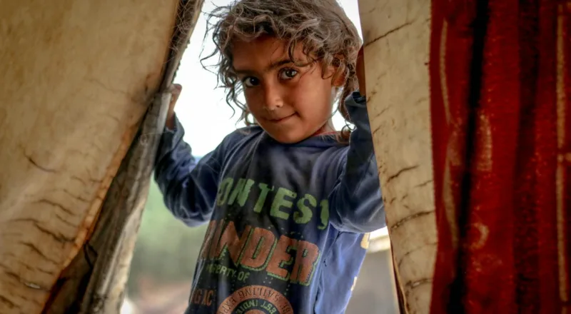 Emotional Neglect in Childhood Image Credit: Photo by Ahmed akacha: https://www.pexels.com/photo/cheerful-ethnic-kid-standing-in-doorway-of-tent-4959225/