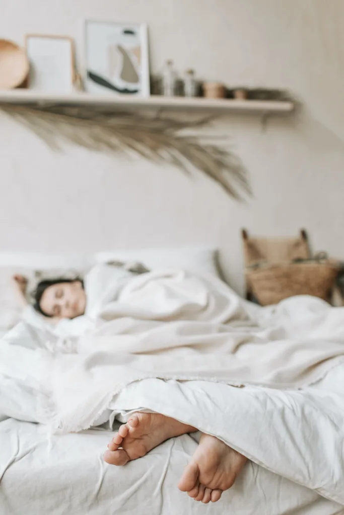 How to Fall Asleep with Anxiety Image Credit: Photo by Vlada Karpovich: https://www.pexels.com/photo/photo-of-a-woman-sleeping-on-a-bed-with-a-white-blanket-5357328/