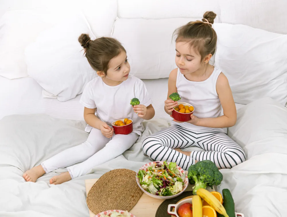 Benefits of Healthy food for Kids Image Credit: <a href="https://www.freepik.com/free-photo/healthy-food-children-eat-fruits-vegetables_10923124.htm#fromView=search&page=1&position=43&uuid=a9ea9fde-c410-4ab3-ab84-f14a0557ba9f">Image by pvproductions on Freepik</a>