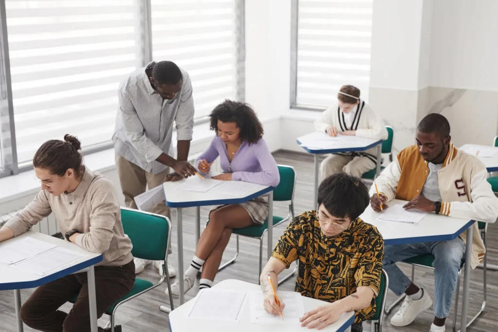 Mental Health Tips for College Students Image Credit: Photo by Andy Barbour from Pexels: https://www.pexels.com/photo/a-high-angle-shot-of-students-taking-exam-inside-the-classroom-6683580/