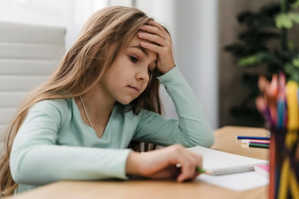 Stress Management for Teens Image Credit: <a href="https://www.freepik.com/free-photo/girl-having-headache-while-doing-online-classes_11905064.htm#fromView=search&page=1&position=46&uuid=e464c5f9-9597-465d-97e9-8f7268ade66f">Image by freepik</a>